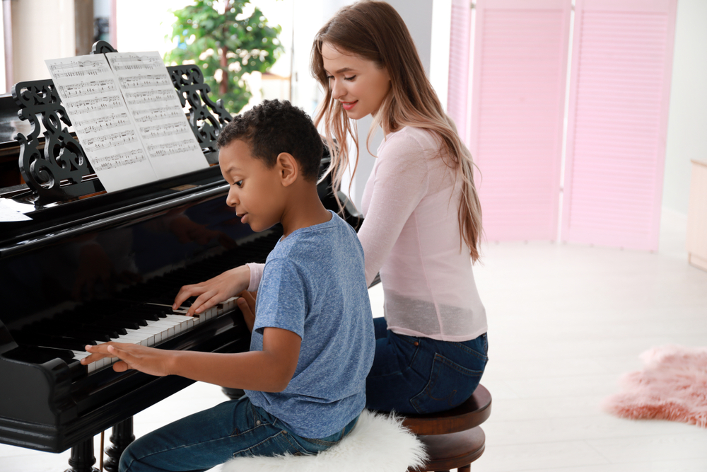 https://grooveacademy.ca/wp-content/uploads/2025/05/Groove.Academy.In-Home-Piano-Lessons.Calgary.jpg